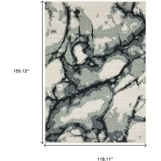 Blue Black And Ivory Abstract Area Rug With Fringe Photo 6