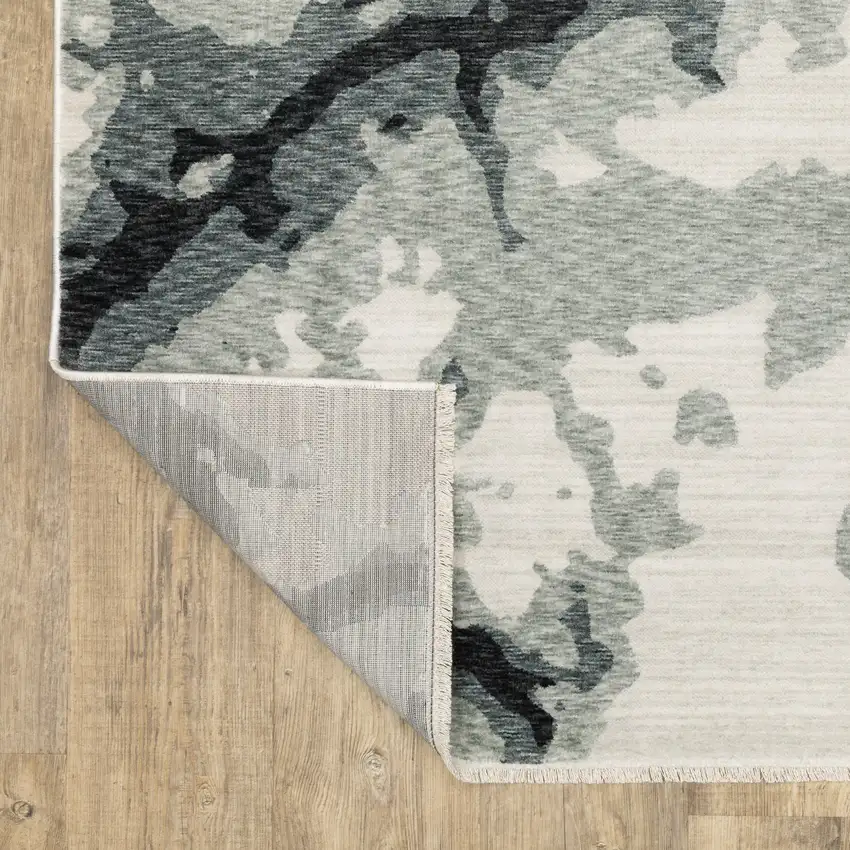 Blue Black And Ivory Abstract Area Rug With Fringe Photo 2