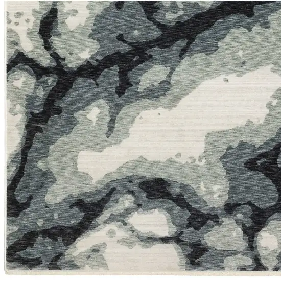 Blue Black And Ivory Abstract Area Rug With Fringe Photo 3