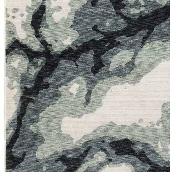 Blue Black And Ivory Abstract Area Rug With Fringe Photo 8