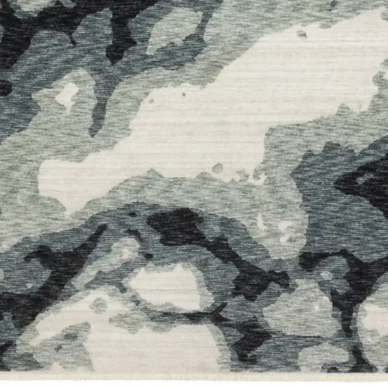 Blue Black And Ivory Abstract Area Rug With Fringe Photo 8