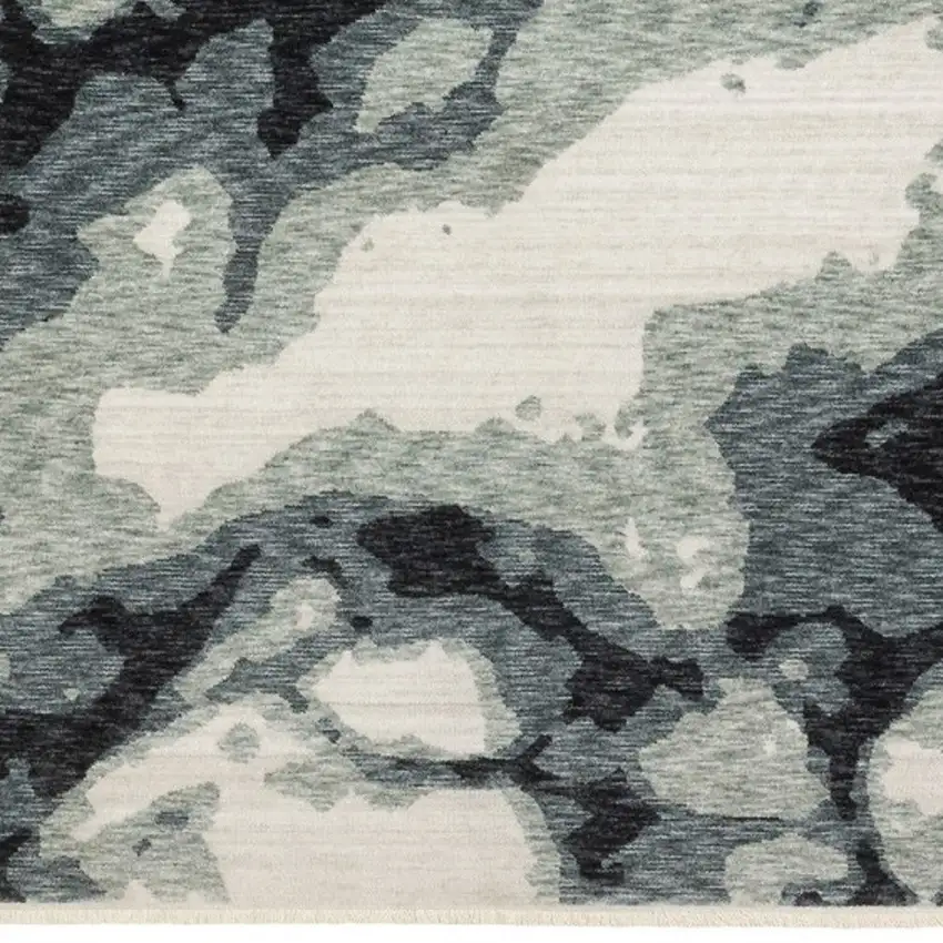 Blue Black And Ivory Abstract Area Rug With Fringe Photo 8