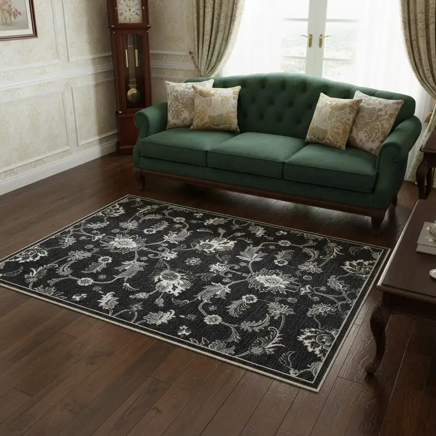 Blue Black And Ivory Floral Area Rug With Fringe Photo 1