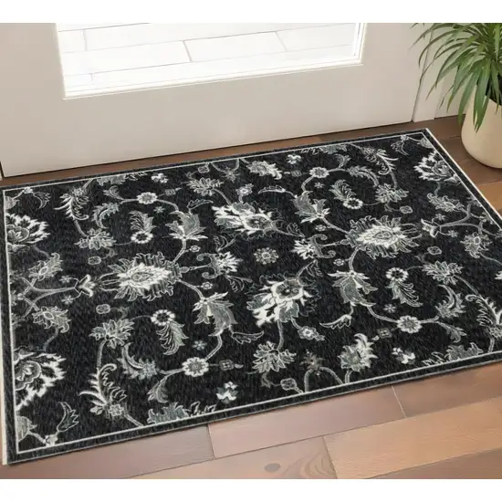 Blue Black And Ivory Floral Area Rug With Fringe Photo 1