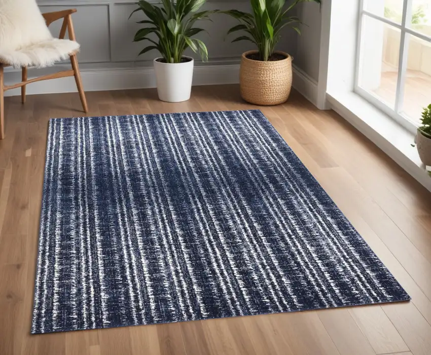 Blue Black and Ivory Power Loom Area Rug Photo 1