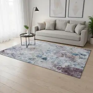 Photo of Blue Blush And Ivory Floral Washable Area Rug With UV Protection
