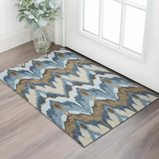 Blue Brown And Beige Ikat Washable Area Rug With UV Protection Photo 1