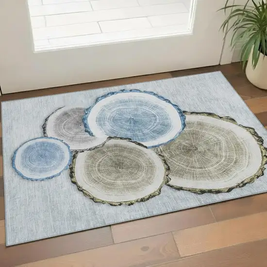 Blue Brown And Ivory Woodland Lodge Washable Area Rug With UV Protection Photo 1