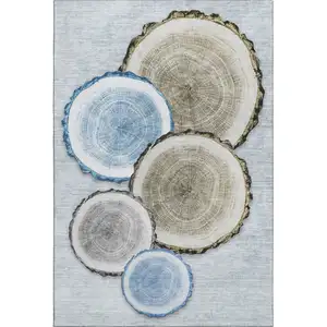 Photo of Blue Brown And Ivory Woodland Lodge Washable Area Rug With UV Protection