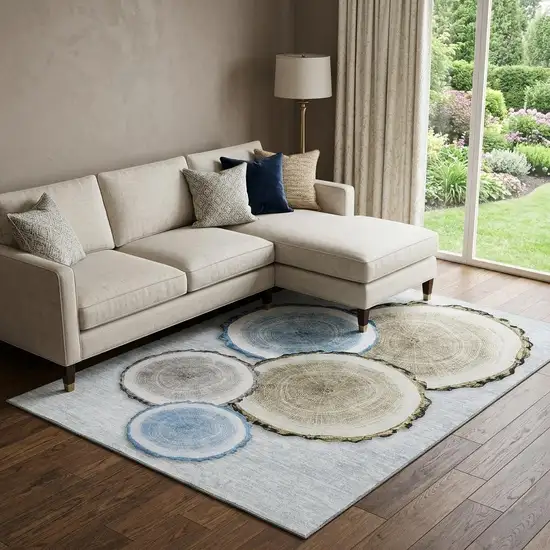 Blue Brown And Ivory Faux Bois Washable Area Rug With UV Protection Photo 1