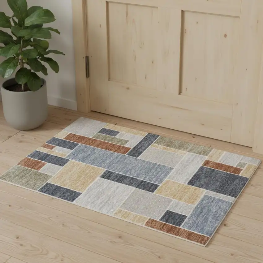 Blue Brown And Tan Geometric Washable Area Rug Photo 1