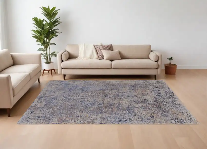 Blue Brown and Tan Abstract Power Loom Area Rug Photo 1