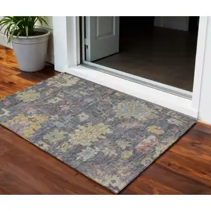 Photo of Blue Charcoal And Gold Floral Washable Indoor Outdoor Area Rug