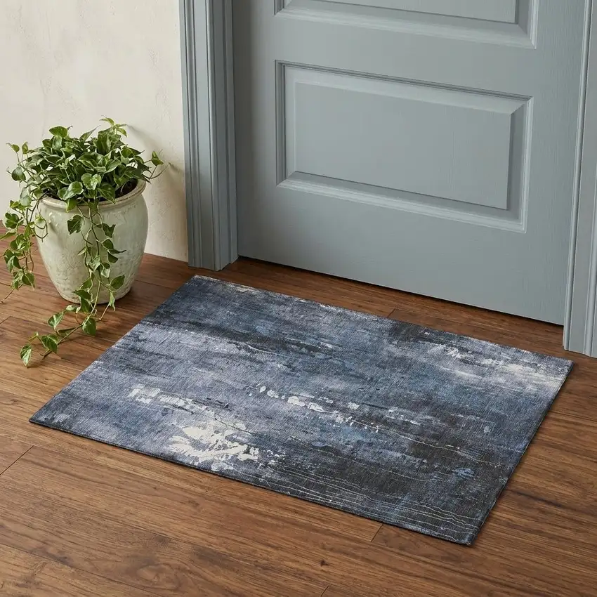 Blue Charcoal And Ivory Abstract Washable Area Rug With UV Protection Photo 1