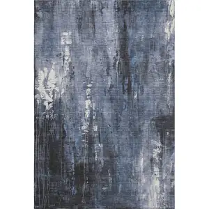 Photo of Blue Charcoal And Ivory Abstract Washable Area Rug With UV Protection