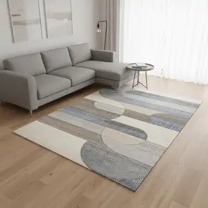 Photo of Blue Cream And Brown Geometric Area Rug