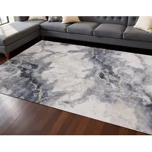 Photo of Blue Cream And Gray Abstract Area Rug
