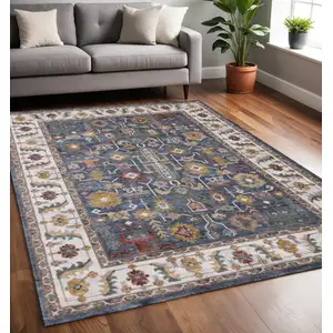 Photo of Blue Cream And Yellow Medallion Area Rug