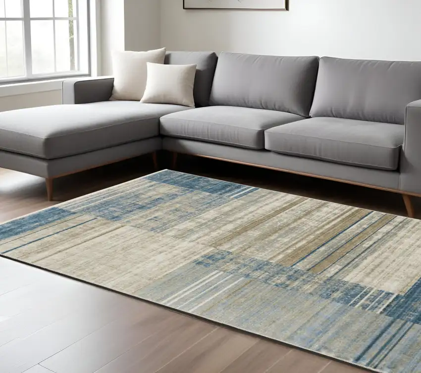 Blue Dark Blue Teal Grey Ivory Beige And Tan Geometric Power Loom Stain Resistant Area Rug With Fringe Photo 1