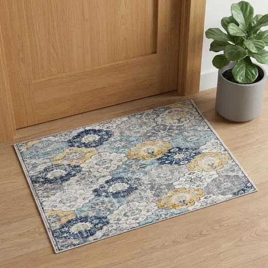 Blue and Yellow Floral Distressed Area Rug Photo 1