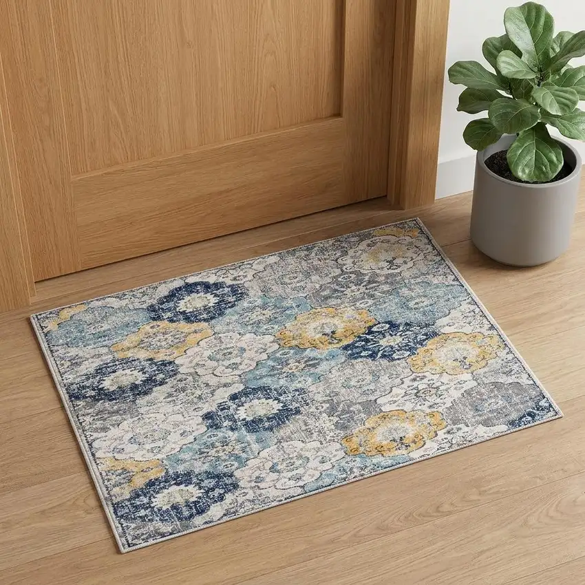 Blue and Yellow Floral Distressed Area Rug Photo 1