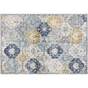 Photo of Blue Distressed Floral Area Rug
