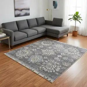 Photo of Blue Floral Distressed Area Rug