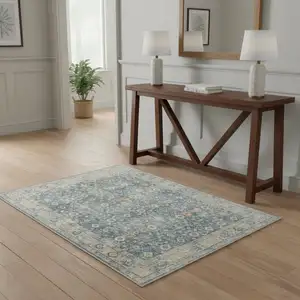 Photo of Blue Floral Distressed Area Rug