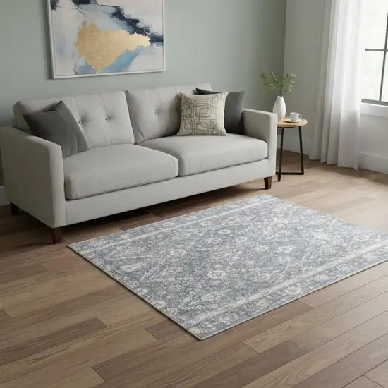 Blue Floral Distressed Area Rug Photo 1