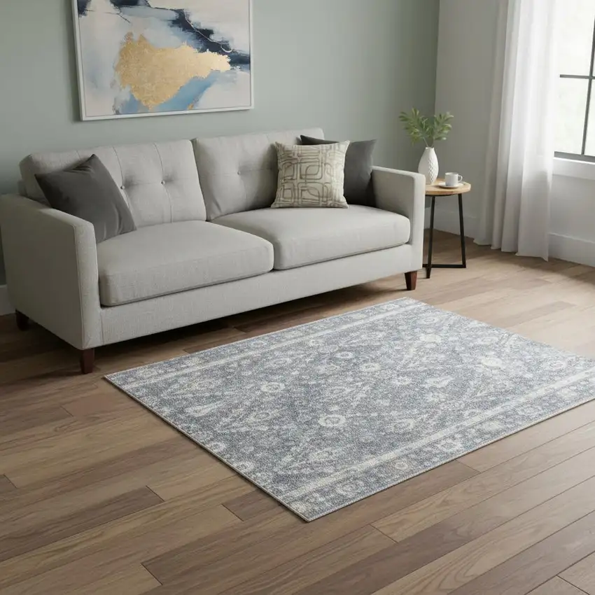 Blue Floral Distressed Area Rug Photo 1