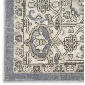 Photo of Blue Floral Power Loom Area Rug