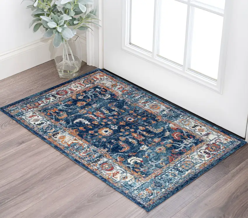 Blue Rust and Orange Floral Power Loom Area Rug Photo 1