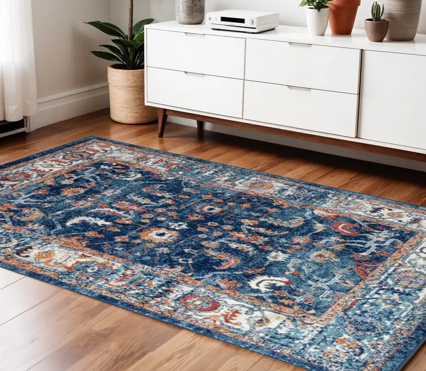 Blue Rust and Orange Floral Power Loom Area Rug Photo 1