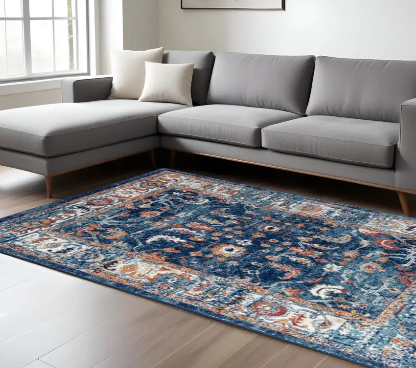 Blue Rust and Orange Floral Power Loom Area Rug Photo 1