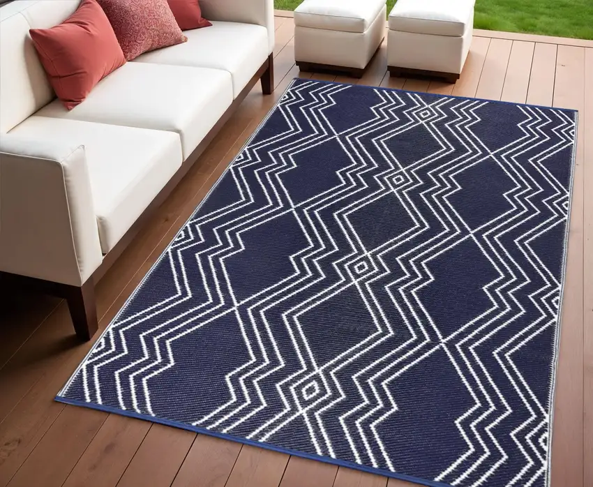 Blue Geometric Machine Braided Distressed Area Rug With UV Protection Photo 1