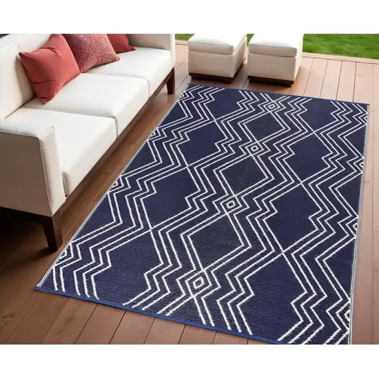 Blue Geometric Machine Braided Distressed Area Rug With UV Protection Photo 1
