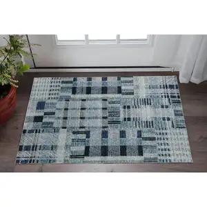 Photo of Blue Geometric Power Loom Stain Resistant Area Rug