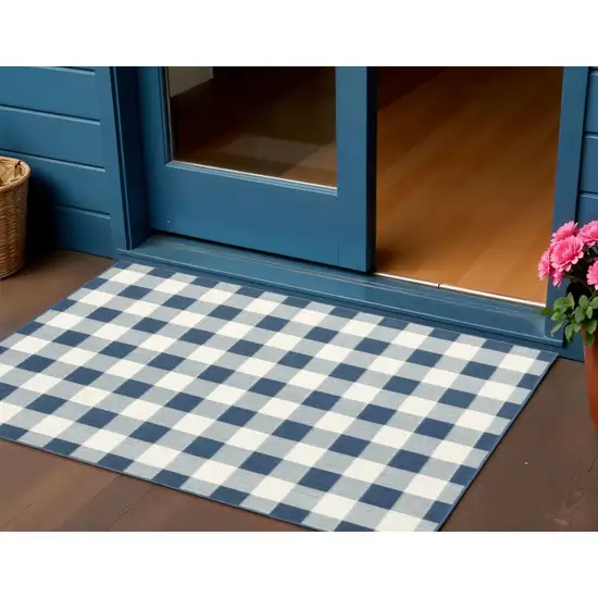 Blue and Ivory Geometric Stain Resistant Indoor Outdoor Area Rug Photo 1