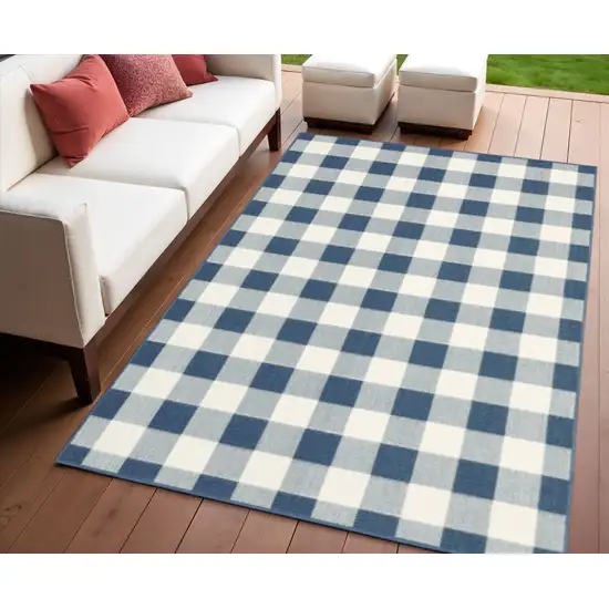 Blue and Ivory Geometric Stain Resistant Indoor Outdoor Area Rug Photo 1