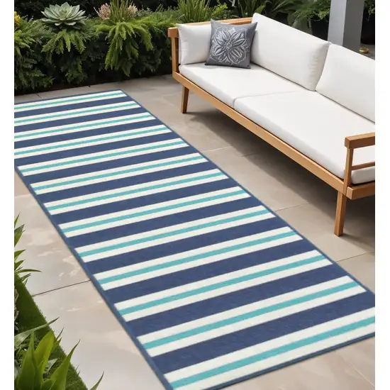 Blue and Ivory Geometric Stain Resistant Indoor Outdoor Area Rug Photo 1