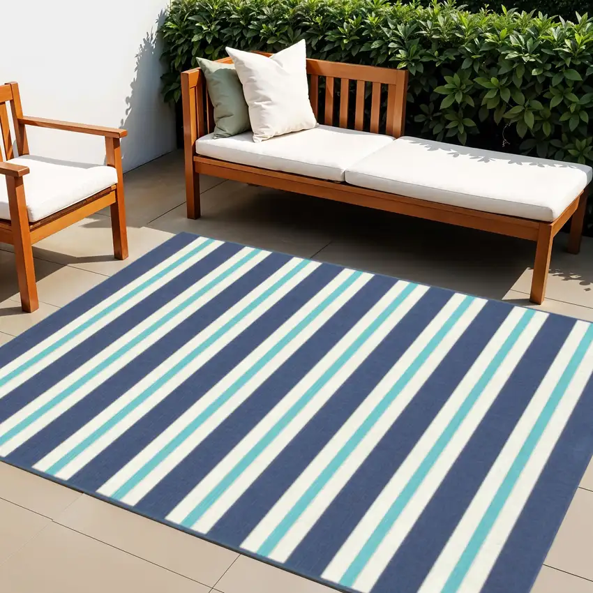 Blue and Ivory Geometric Stain Resistant Indoor Outdoor Area Rug Photo 1