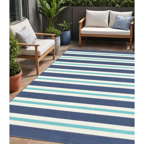 Blue and Ivory Geometric Stain Resistant Indoor Outdoor Area Rug Photo 1