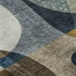 Photo of Blue Gold And Beige Abstract Geometric Washable Area Rug With UV Protection