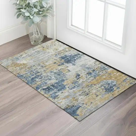 Blue Gold And Beige Abstract Washable Area Rug With UV Protection Photo 2