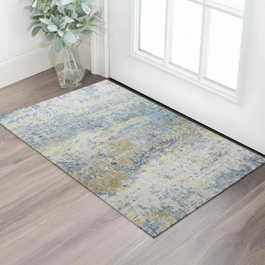 Blue Gold And Beige Abstract Washable Area Rug With UV Protection Photo 1