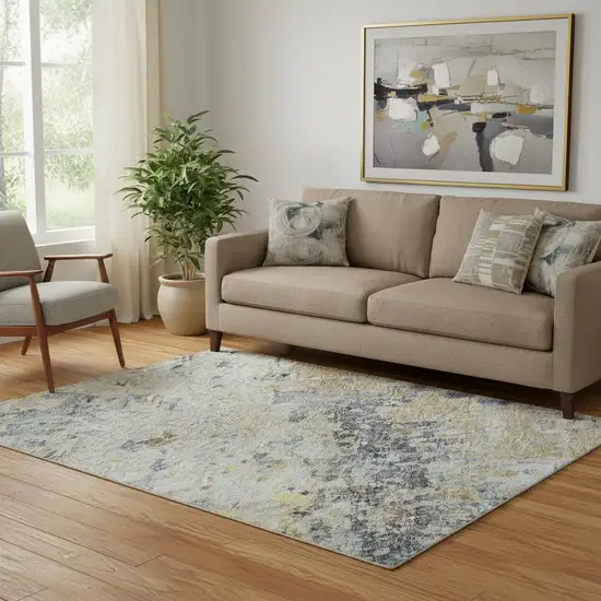 Blue Gold And Beige Abstract Washable Area Rug With UV Protection Photo 2