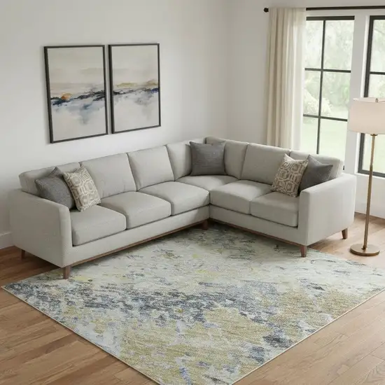 Blue Gold And Beige Abstract Washable Area Rug With UV Protection Photo 2