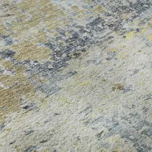 Photo of Blue Gold And Beige Abstract Washable Area Rug With UV Protection