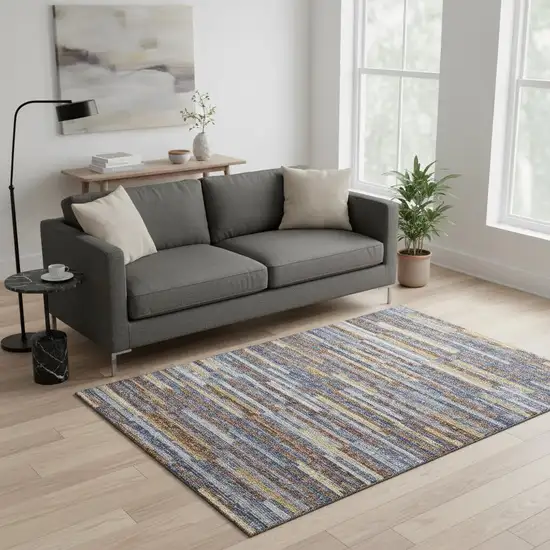 Blue Gold And Brown Abstract Washable Area Rug With UV Protection Photo 1