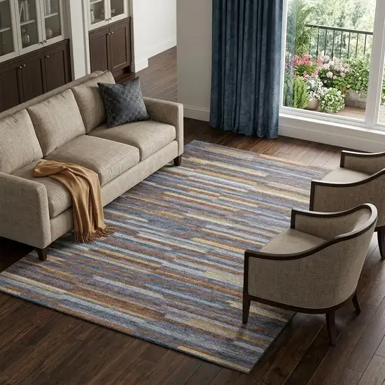 Blue Gold And Brown Abstract Washable Area Rug With UV Protection Photo 1